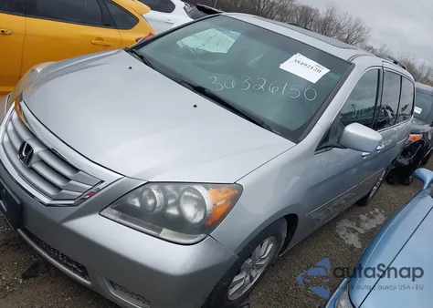 2010 Honda Odyssey Ex-L из США, поврежденный, VIN 5FNRL3H77AB041004